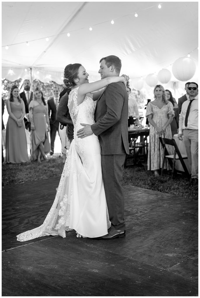Couple's first dance in reception tent for at home Maryland wedding.