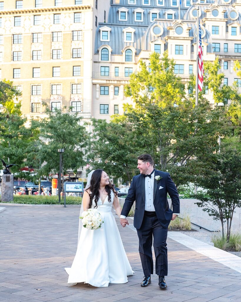 DC wedding photo of bride and groom outside The Willard.