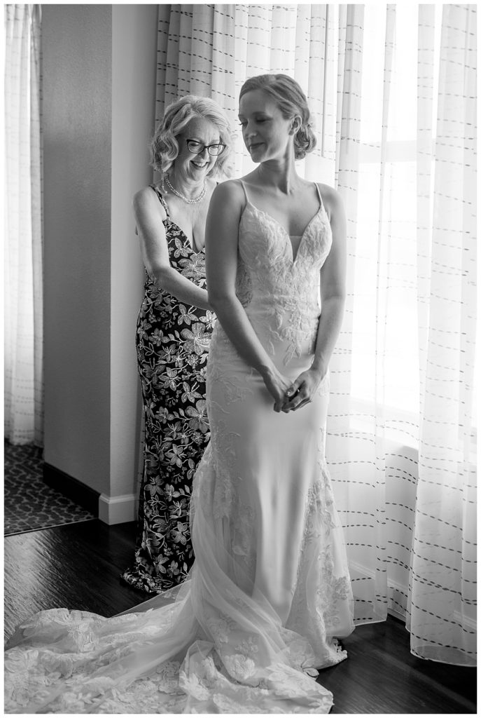 Mother of the bride helps her get ready for  Washington, DC wedding.
