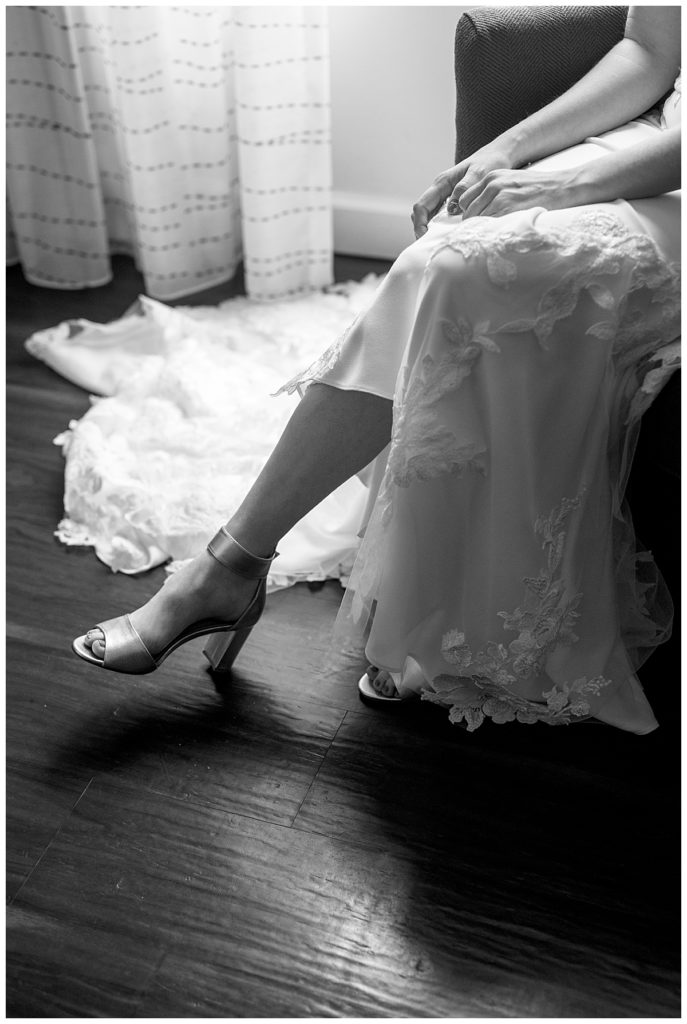 Bride puts on shoes for her DC wedding.