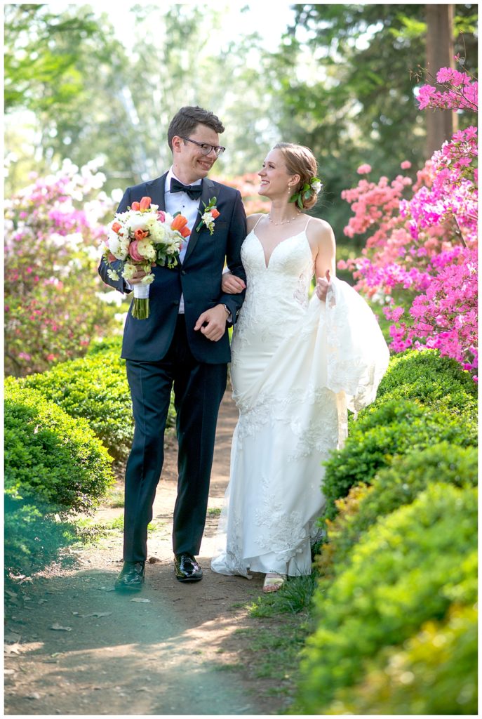 Bride and groom take a stroll at the National Arboretum before their ceremony.