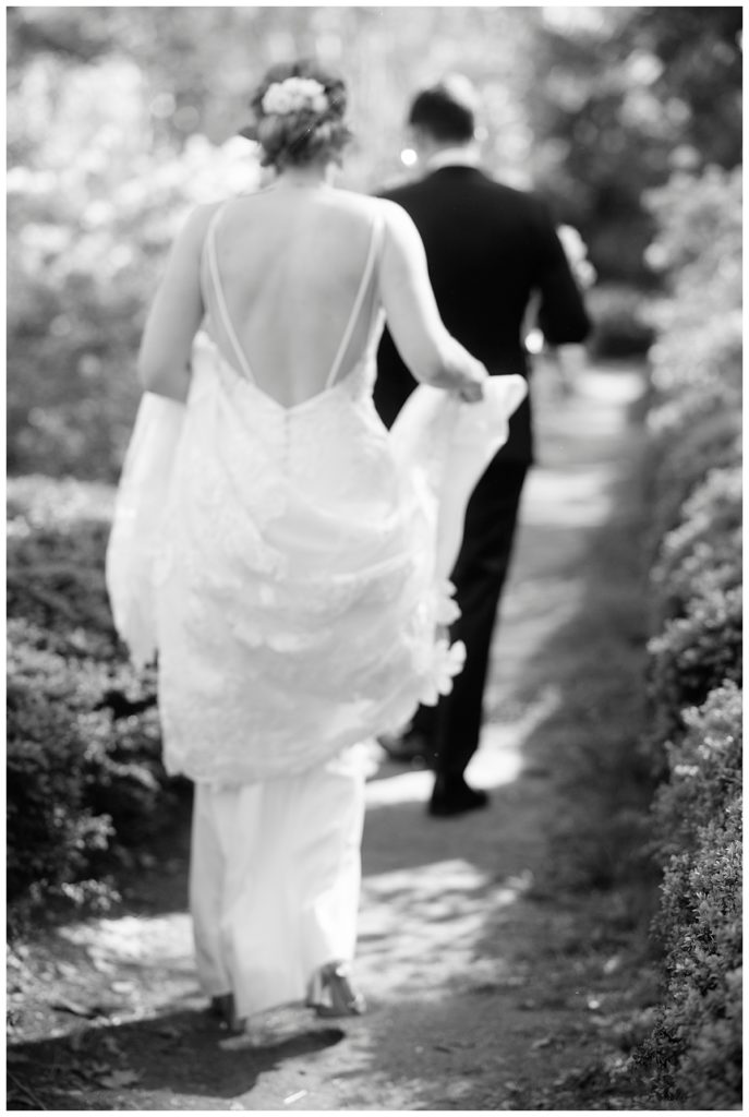Bride walks to her ceremony at the U.S. National Arboretum, a DC wedding venue.