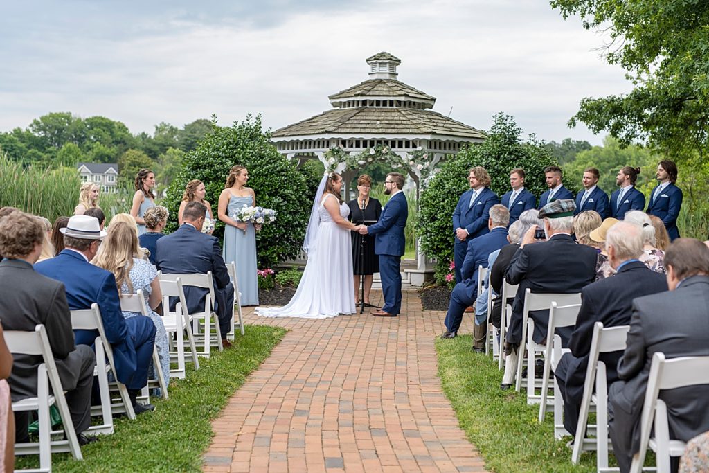Waterfront ceremony by Nadine Nasby Photography, Eastern Shore Maryland wedding photographer.