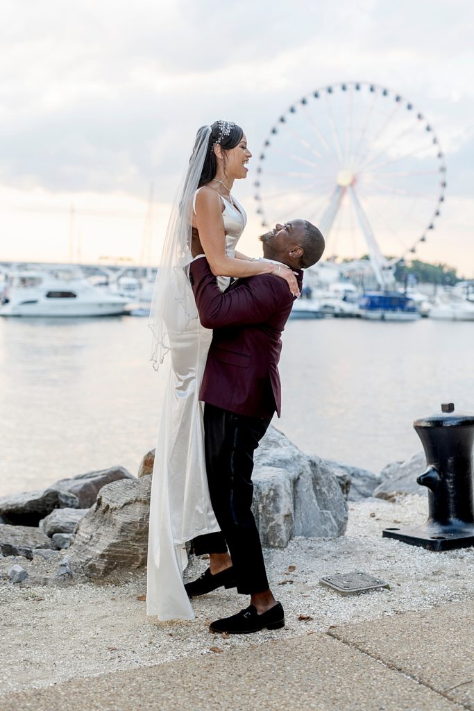 The Capitol Wheel is the backdrop for wedding couple sunset photos