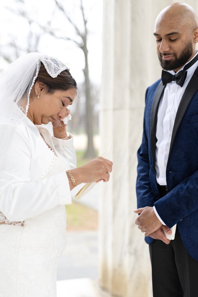 Bride tears up saying vows - DC War Memorial wedding
