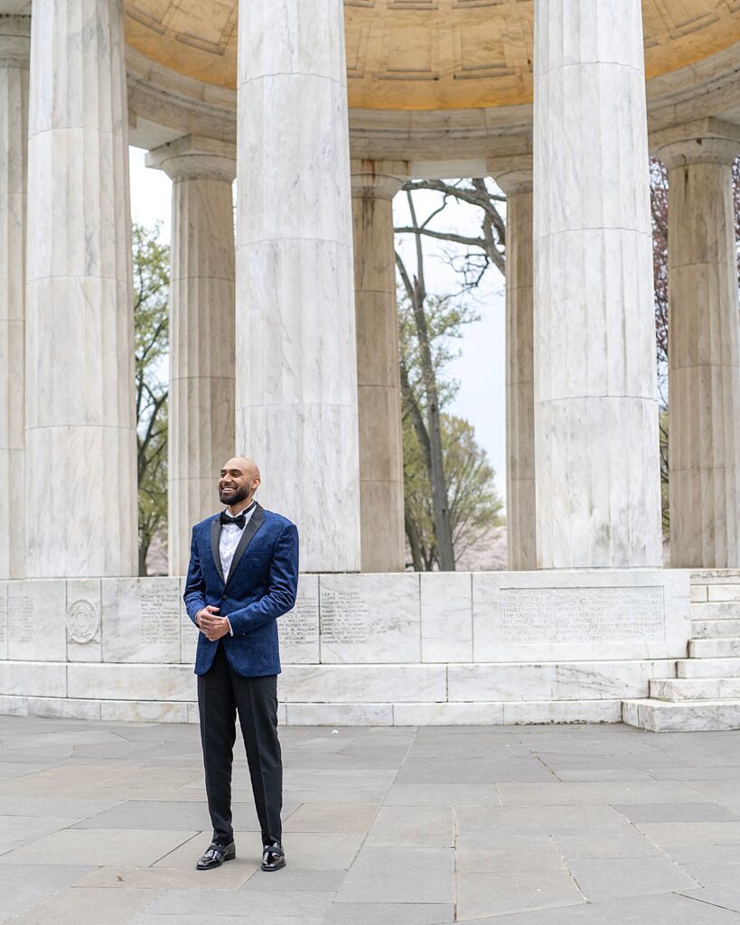 Groom waits to see his bride for first time before their DC War Memorial wedding.