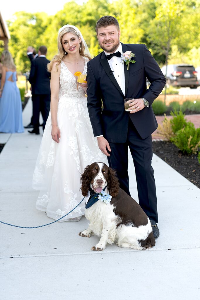 Bride and groom with best dog