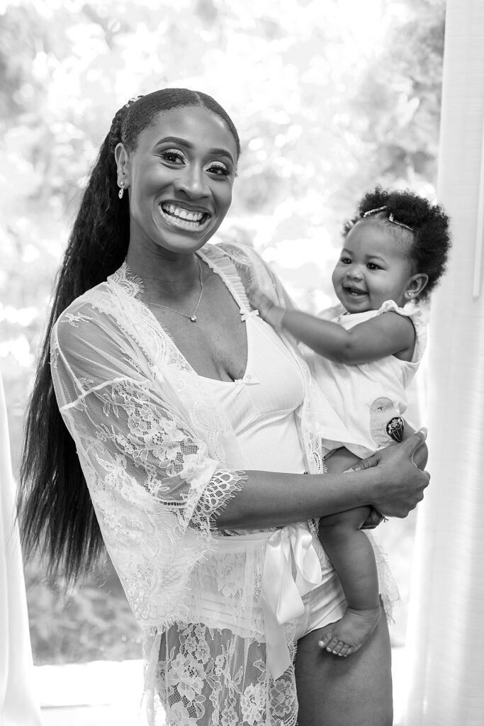 Bride and daughter photography before Maryland wedding at The Annapolis Waterfront Hotel