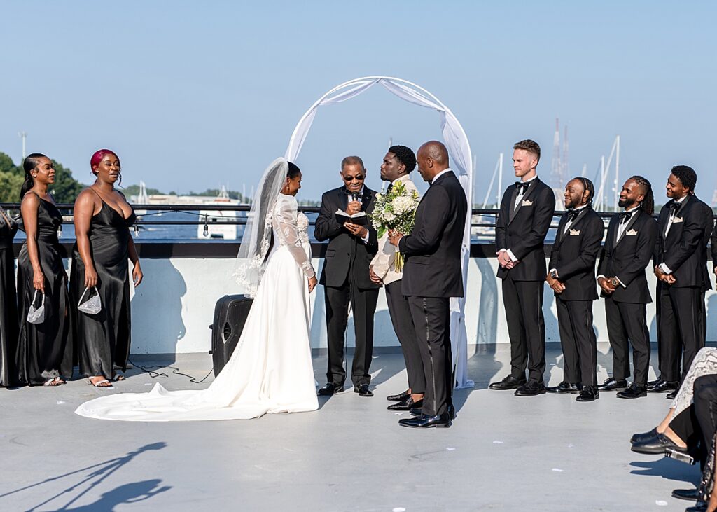 Outdoor wedding ceremony on the rooftop of the Annapolis waterfront hotel.