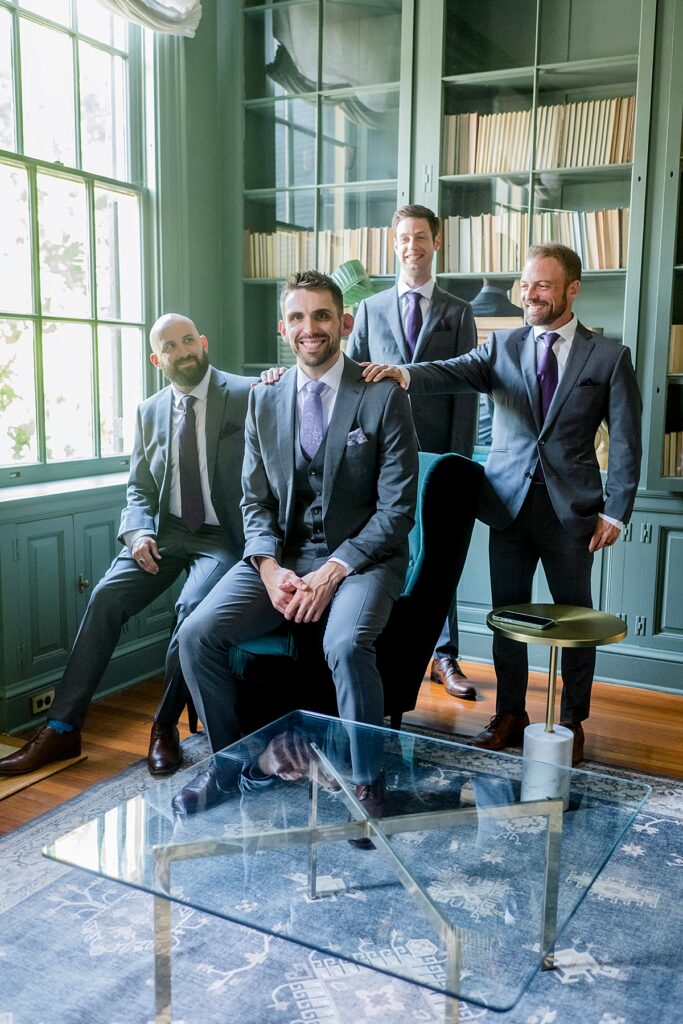 Groomsmen portrait in the library of the Rust Manor House