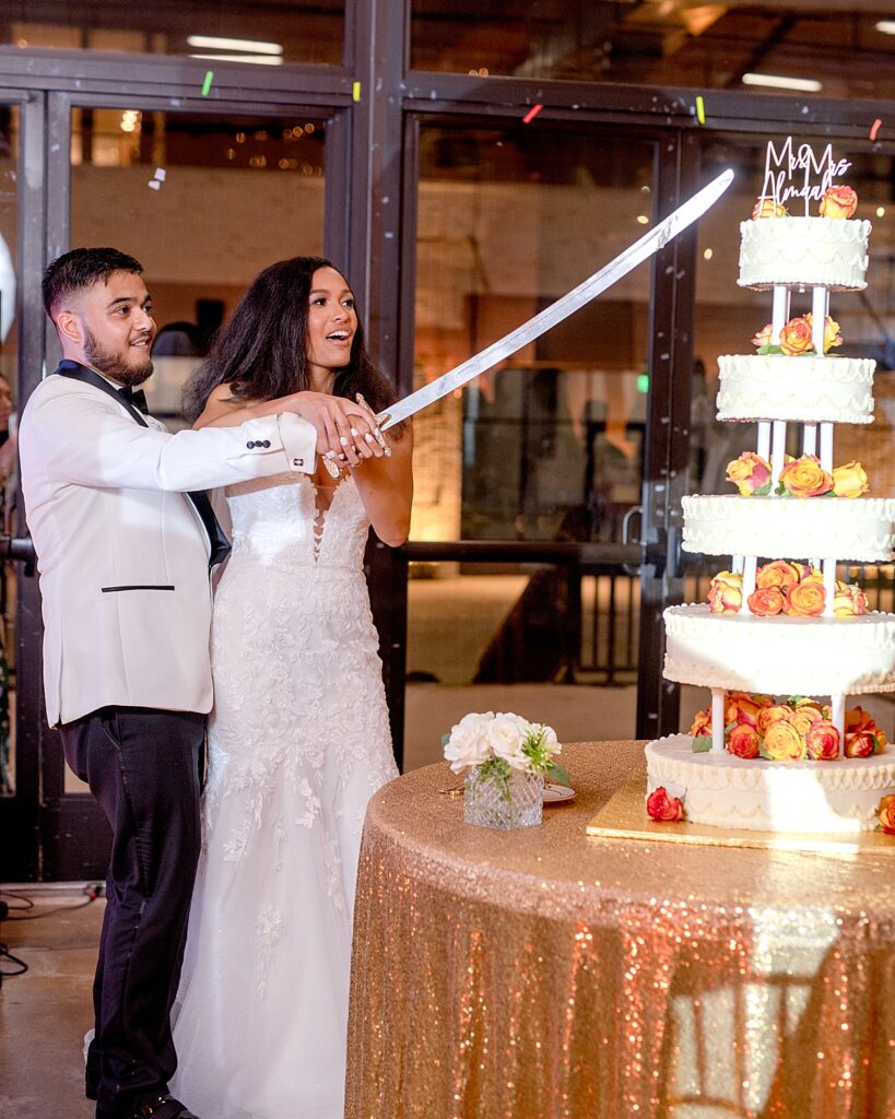 Bride and groom cut their cake at Dock 5 in DC