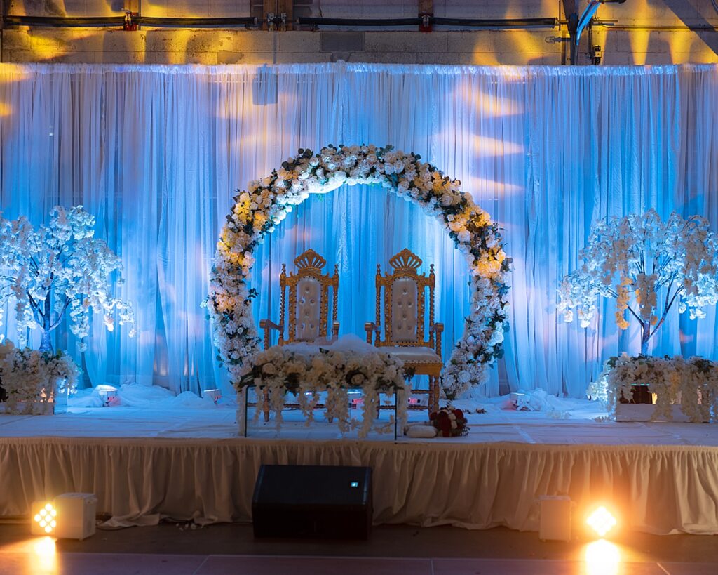 Ceremony altar and reception stage at Dock 5