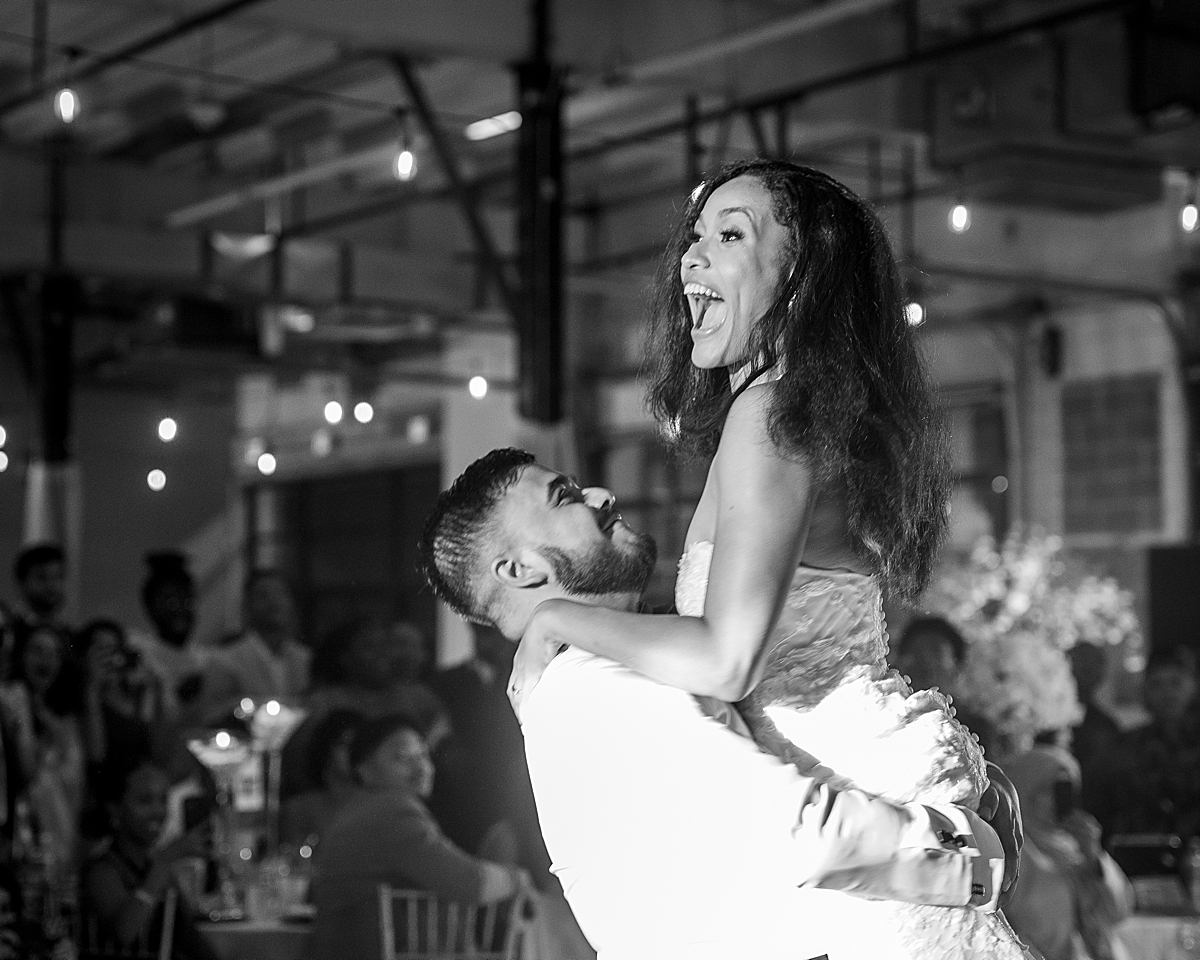 Groom catches bride in first wedding dance at Dock 5