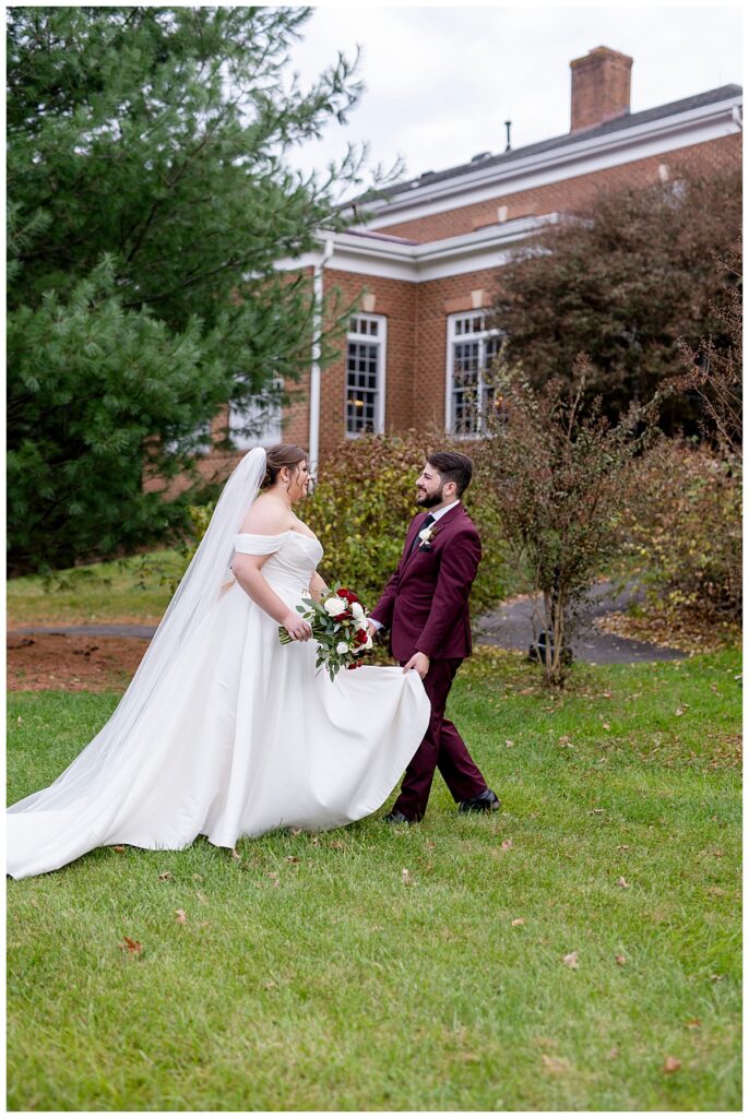 Groom leads his bride | Rose Hill Manor
