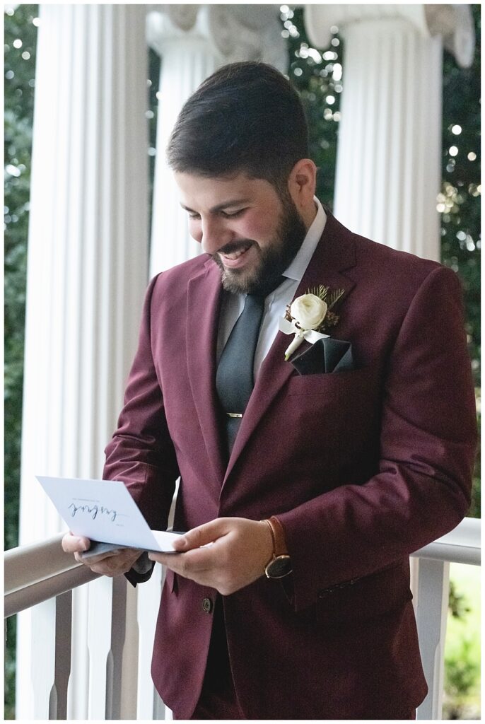 Groom reads private vows from his bride before ceremony
