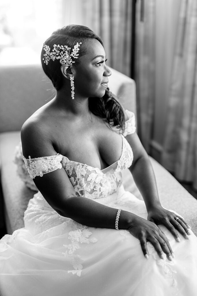 Bride looks out the window | The Westin Hotel Georgetown DC