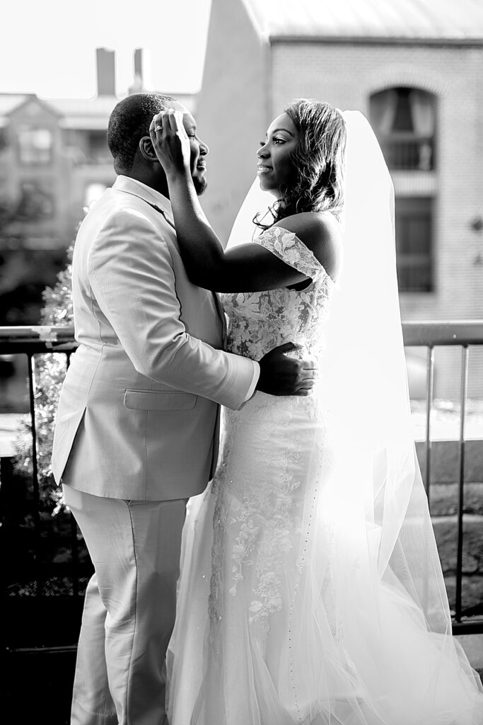 Bride touches cheek of her groom \ Pinstripes DC wedding