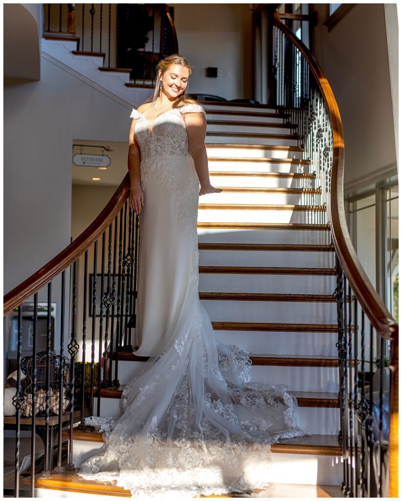 Beautiful bride on the staircase in the Harvest Room at Cana Vineyards