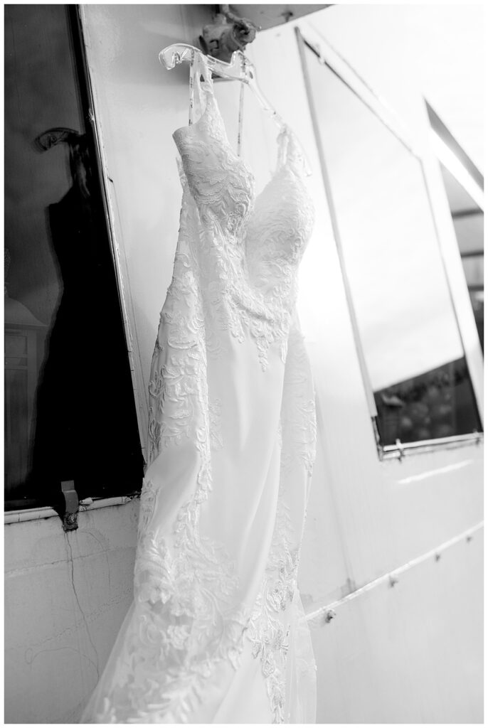 Bride's dress hangs from The Odyssey City Cruise ship in DC