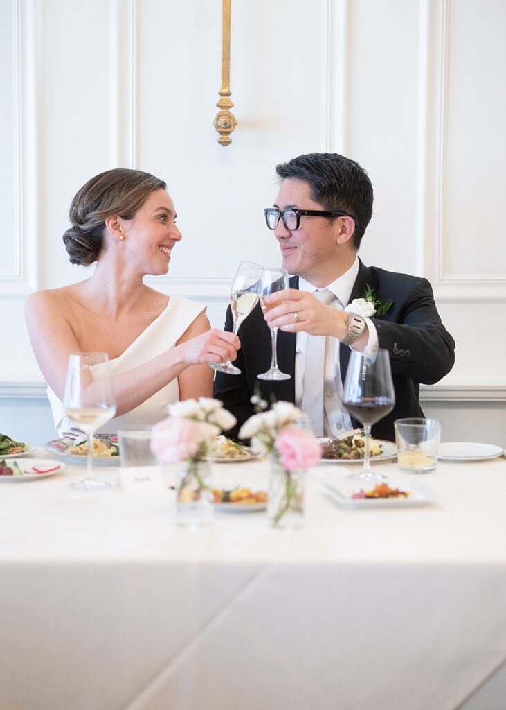 Bride and groom toast each other at their elegant wedding reception | DC wedding photographers | Cedar Knoll Inn