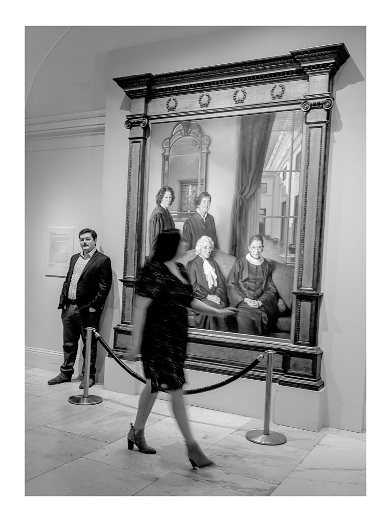 Washington DC engagement photographer | couple in front of the four female US Supreme court justices portrait
