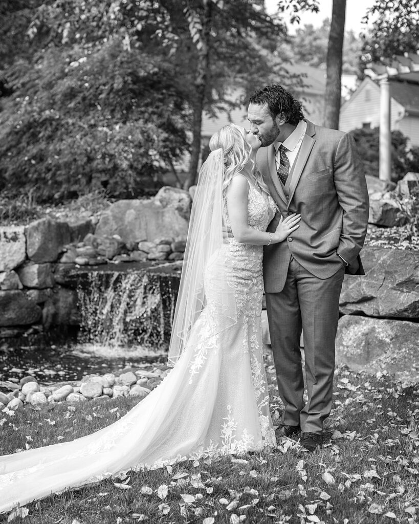 Bride and groom kiss after seeing each other for the first time before ceremony. Photo by Maryland wedding photographer Nadine Nasby Photography