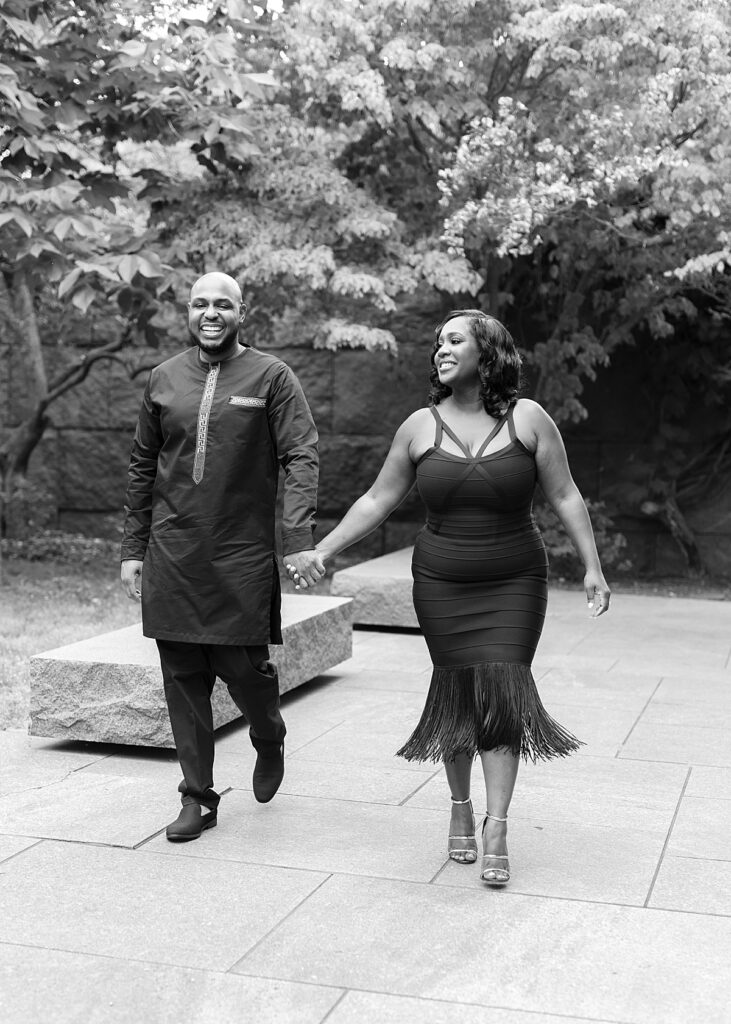 Couple walking through the FDR memorial for their professional photographer Washington DC