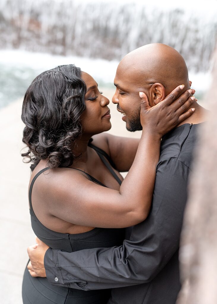 Couple embrace in front of the lens of professional photographer in Washington DC Nadine Nasby Photography.