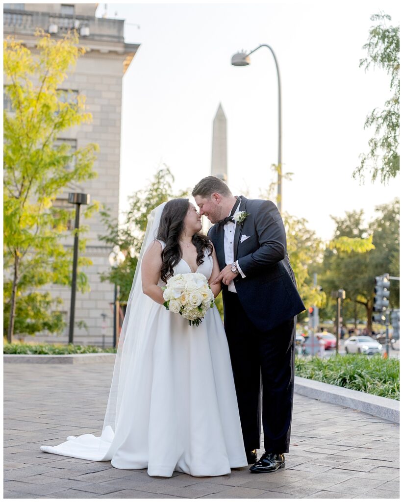 Couple portrait by the National Monument. Their wedding was at The Willard, one of the best wedding venues in Washington, DC