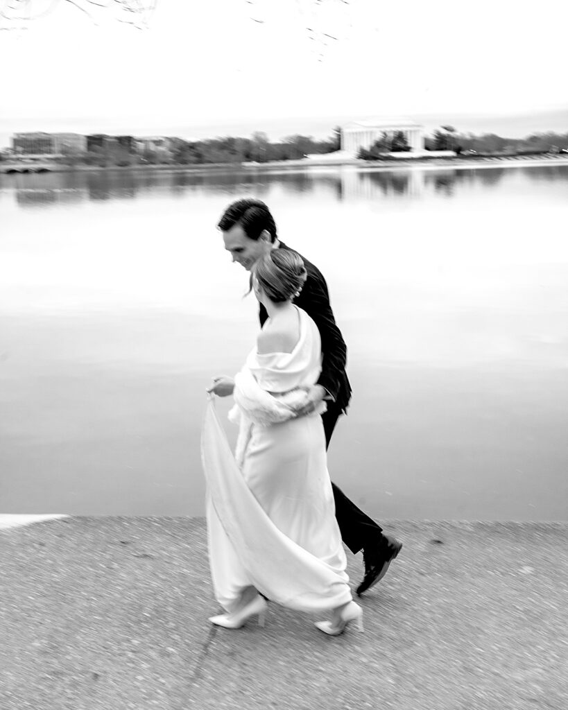 Walking along the tidal basin after their wedding in DC