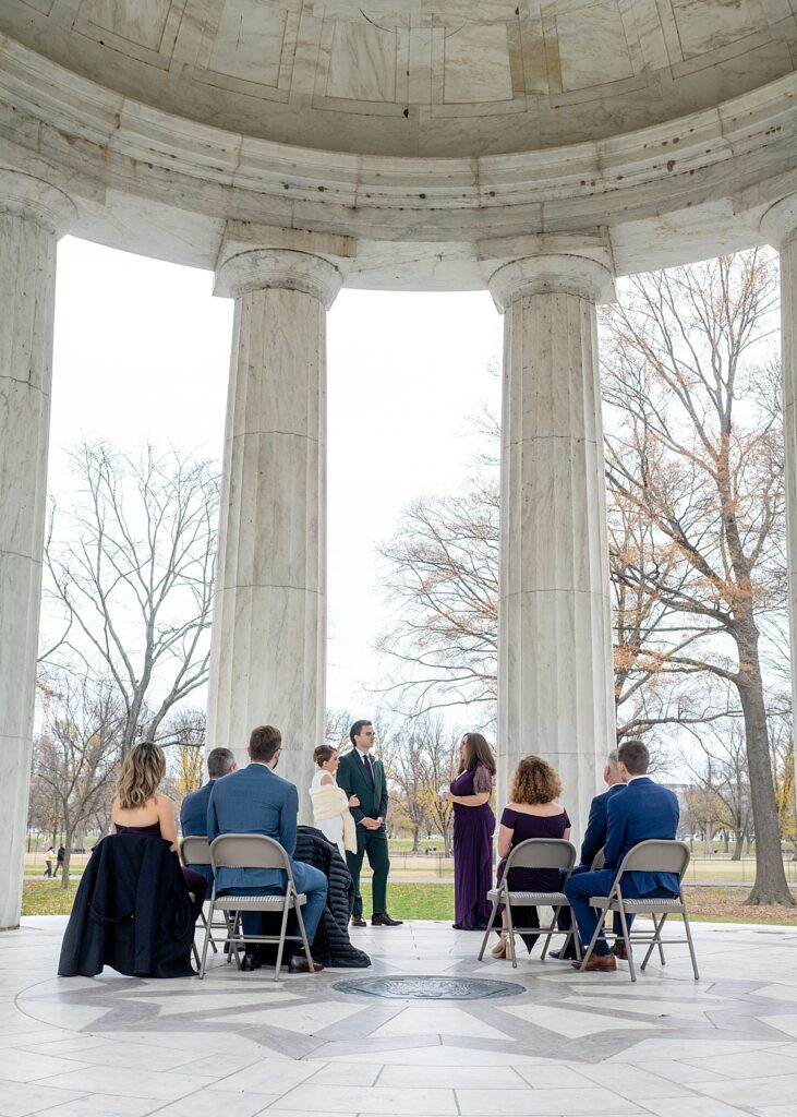 Family civil wedding ceremony at WWII Memorial in DC