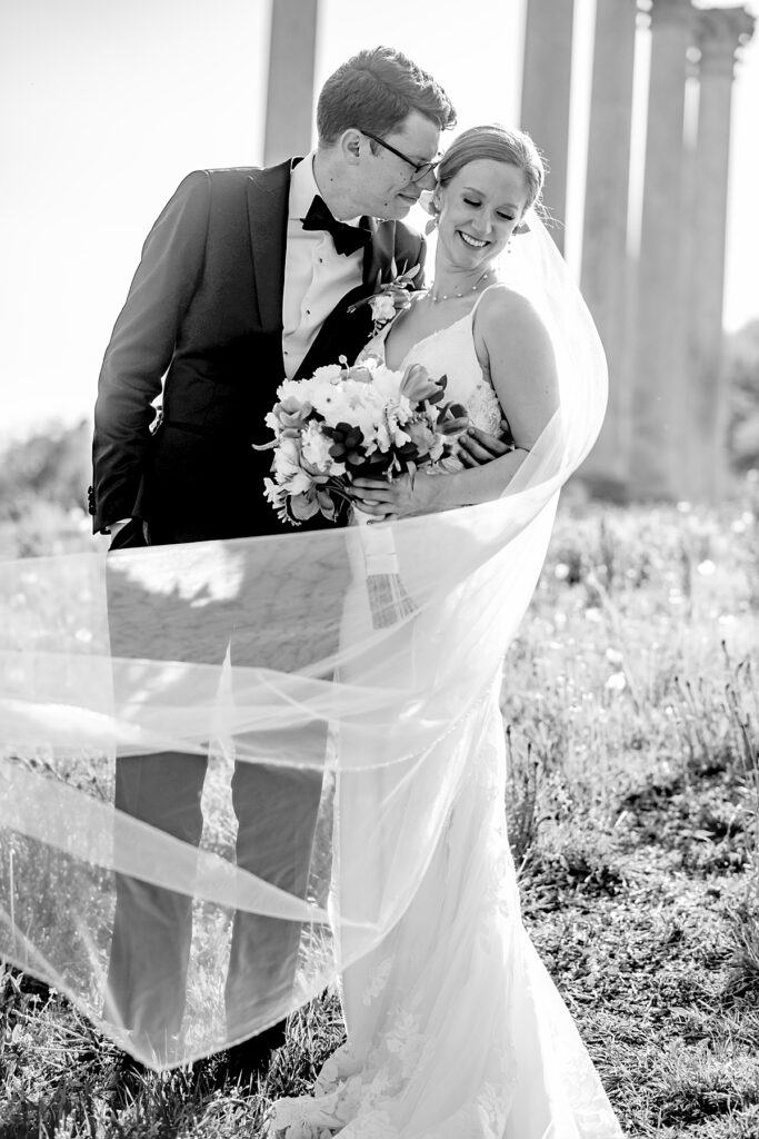 Bride hugs his bride at their wedding at the U.S. Aboretum, one of the top venues in DC.