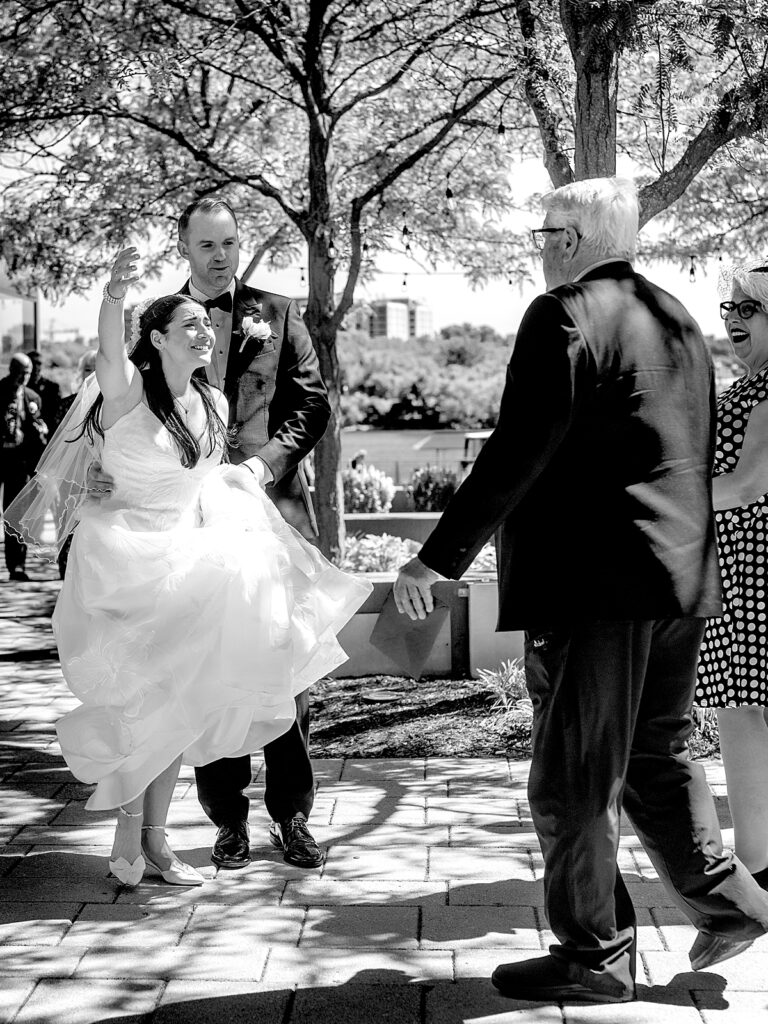 Bride greets guests before her District Winery DC wedding